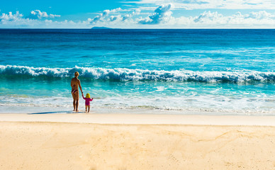 mother and child on the beach