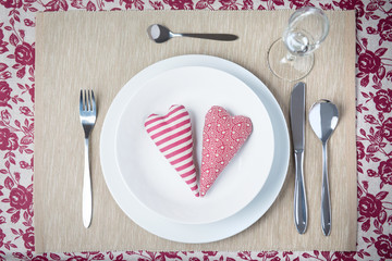 Valentine dinner concept - two hearts on a plate