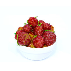 Red strawberries in a white saucer isolated on white