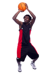 Fototapeta premium Basketball player with a ball, isolated on a white background