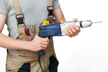 Worker with drill