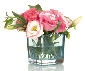 Bouquet of eustoma flowers in vase isolated on white