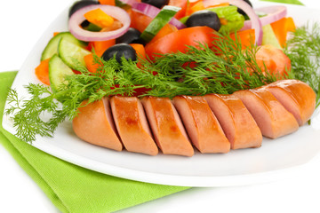Grilled sausage with fresh salad close up