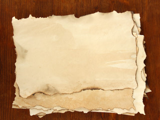 Old paper on wooden background