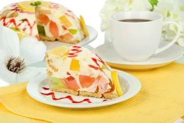 Delicious jelly cake on table close-up