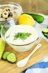 Cucumber yogurt in glass bowl,