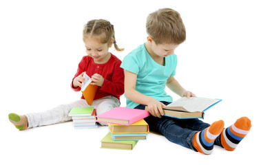 Little children with books isolated on white