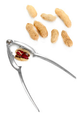 Nutcracker with nuts isolated on white