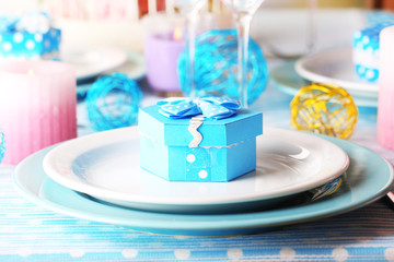 Table serving with colorful tableware close-up