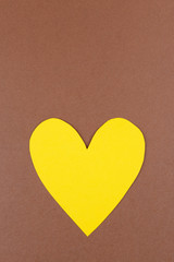 Fototapeta premium Paper heart on brown background