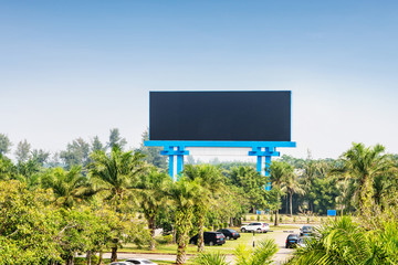 billboard stand by the road