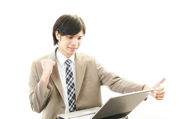 ガッツポーズのビジネスマン