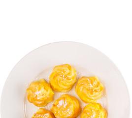 Home made cream puff on a white background
