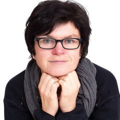 Portrait of a woman with glasses in middle age