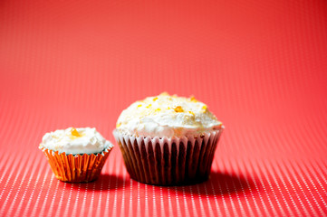 one-bite small chocolate cupcake and normal size