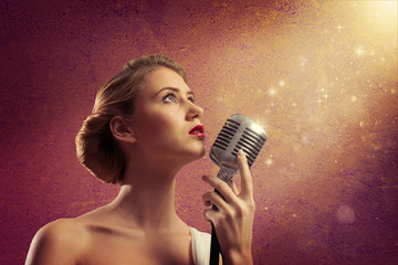 attractive female singer with microphone