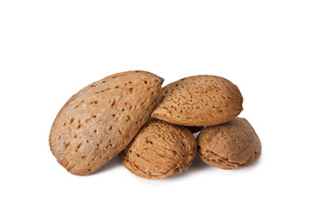 natural raw almonds on white background