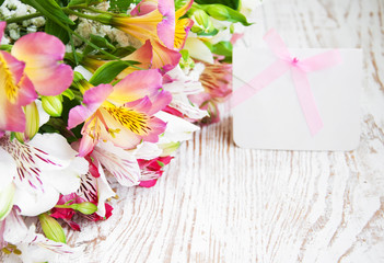 alstroemeria flowers with a white card
