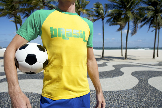 Soccer Player in Brasil Shirt Holding Football Copacabana Rio