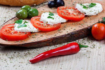 Caprese with olives