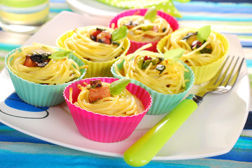 pasta nests baked in silicone muffin molds