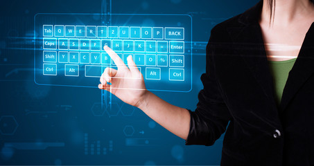 Girl pressing virtual type of keyboard