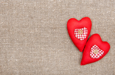 Textile hearts on the burlap
