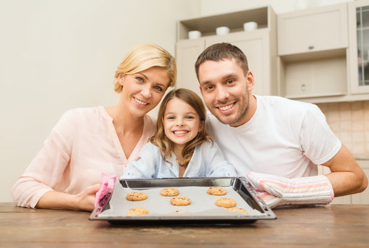 happy family making cookies at home