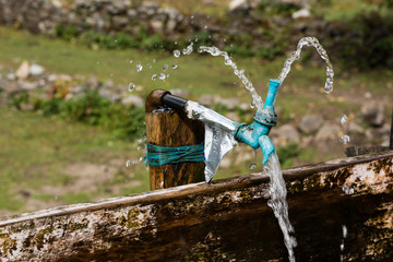 Leaking Tap at a Drinking Trough, Himalaya, Nepal