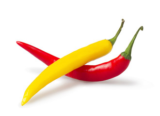 Red and yellow hot chili pepper isolated on white