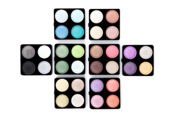Eight eyeshadow palettes isolated on white
