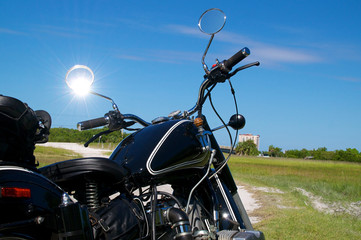 vintage motorcycle on dirt road
