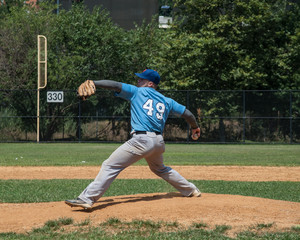 Pitcher at Mound, Throwing the Ball