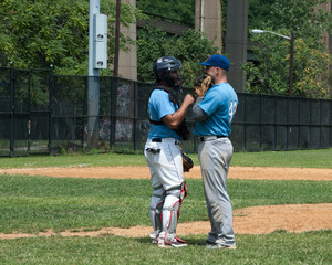 Pitcher and Catcher Talking