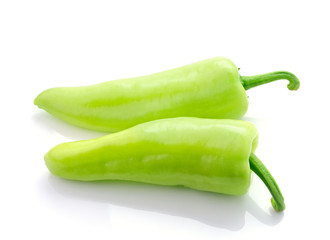 Green hot chili pepper on white