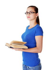 Young woman student with book.