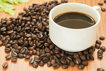 Coffee cup and beans