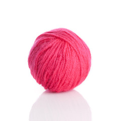 Ball of knitting yarn on a white background