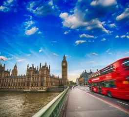 Wall murals London red bus Westminster Bridge traffic at sunset. Blurred Red Bus crossing t