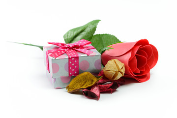 Gift and red rose