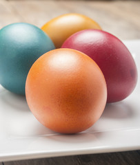 Bright and cheerful Easter still life with rainbow color eggs