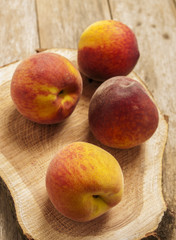 peaches in wooden background