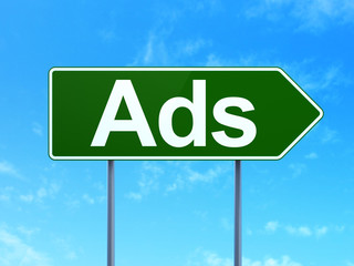 Marketing concept: Ads on road sign background
