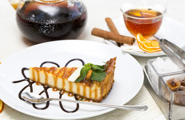 piece of cheese cake on a table in a restaurant