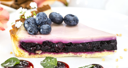 piece of blueberry pie on a table in a restaurant