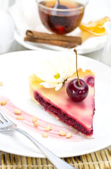 piece of cherry pie on a table in a restaurant