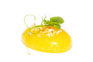 Molecular Cuisine mango jelly on white background