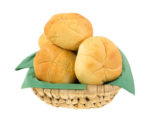 Bulkie rolls in wicker basket with napkins