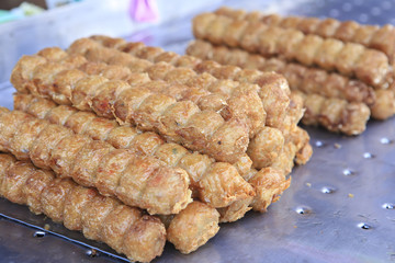 Fried sausage on the market
