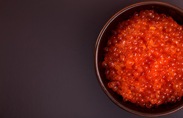 Bowl of red caviar top view